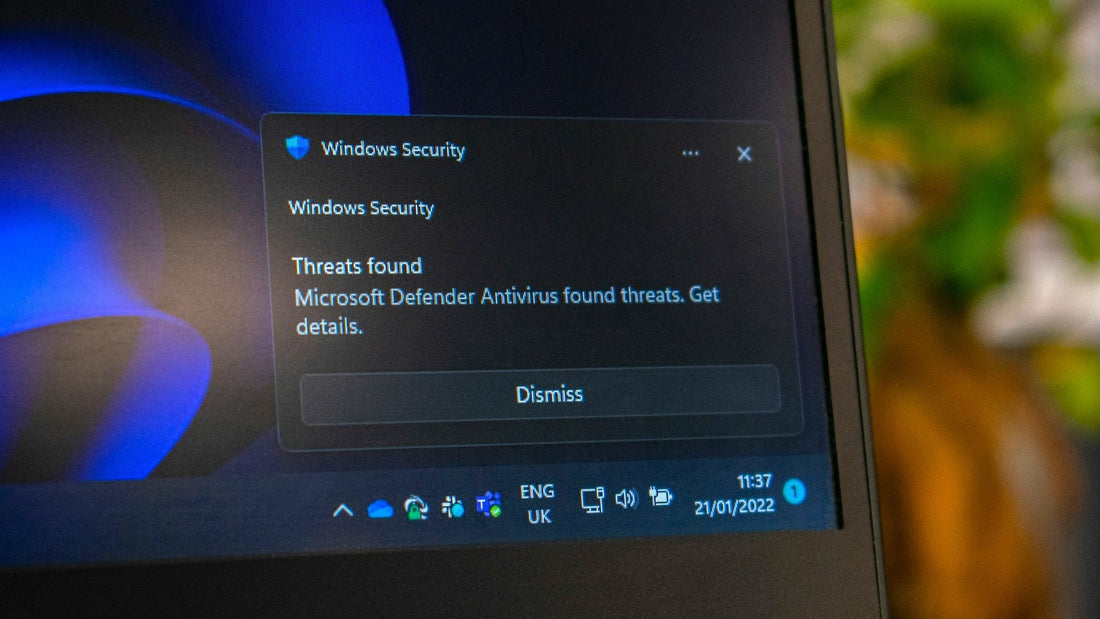 Ein Laptop-Bildschirm stellt ein Windows-Security-Pop-Up dar.